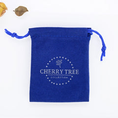 Cherry Tree Collection Rhodonite stones for Reiki sessions and mindful display.