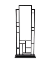 Circadian Optics Lattis bright light therapy desk lamp on a modern desk for daytime focus.