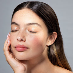 Cliganic Grapeseed Oil label close-up shows organic, cold-pressed purity for hair care