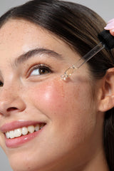 Cliganic Moringa Oil dropper image highlighting lightweight hydration for nails.