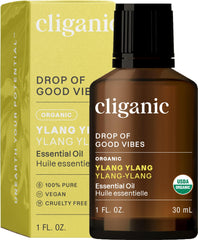 Cliganic Ylang Ylang Essential Oil bottle pour for diffuser use and aroma.