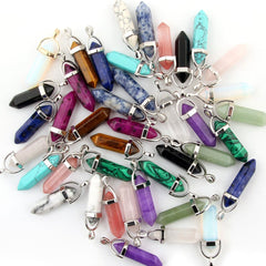 Cmidy chakra pyramid healing points pendants closeup in varied colors for crafts.