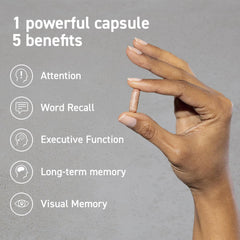 CocoaVia Memory & Focus capsule held in hand for easy daily use.