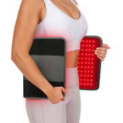Comfytemp red light therapy pad on the back for convenient at-home recovery.