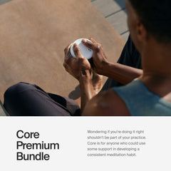 Core Meditation Trainer paired with app on phone for guided sessions.