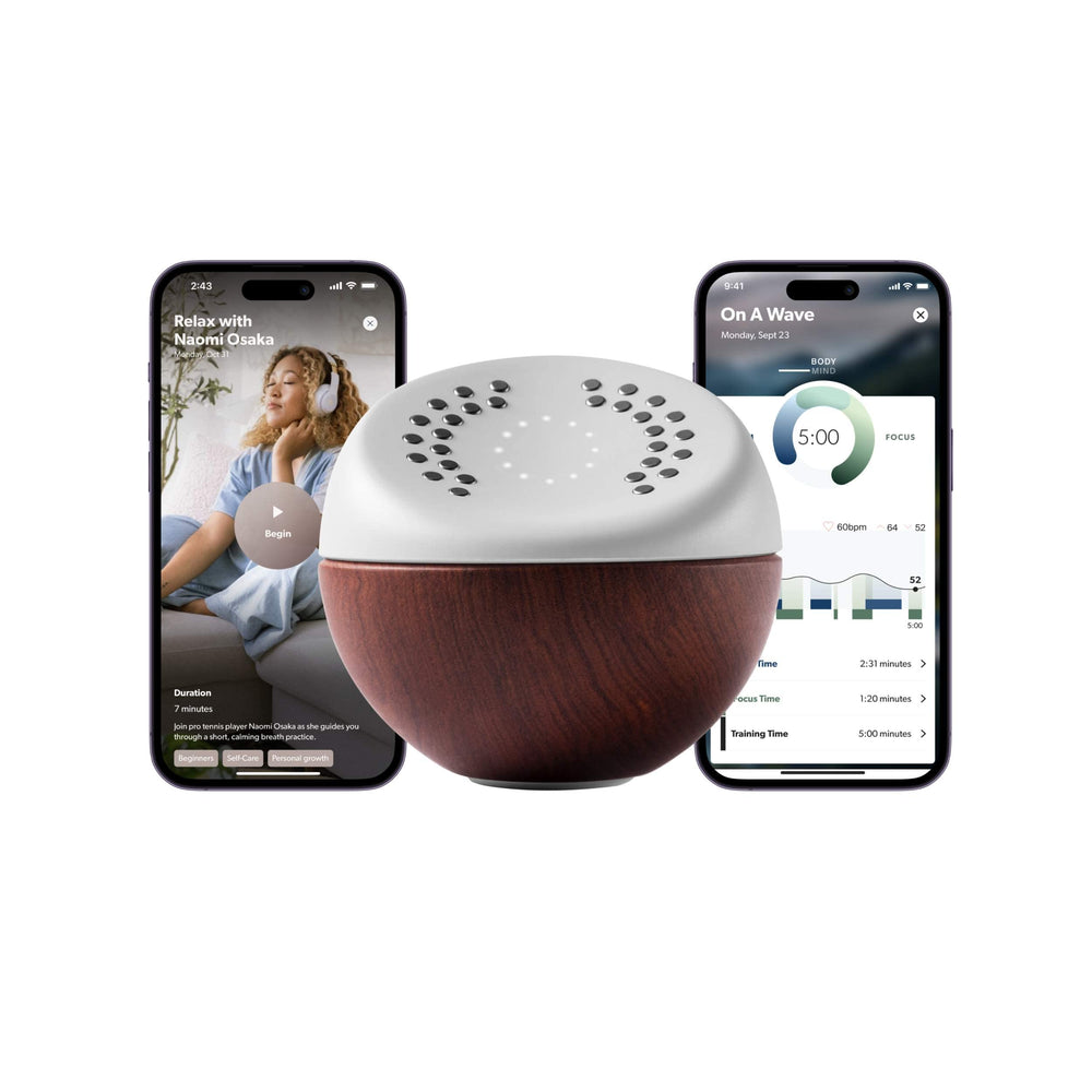 Core Meditation Trainer in natural wood with ECG sensors guiding calm breathing.