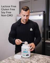 Core Nutritionals Iso Whey scoop demonstrates easy measurement for precise nutrition.
