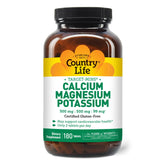 Country Life Target Mins bottle pour shows balanced calcium, magnesium, potassium for everyday bone and heart health