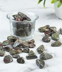 Crocon Dragon Bloodstone varied colors in a pile for crystal grids