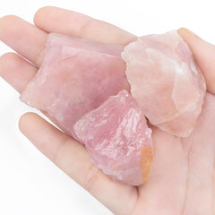 Crocon Rose Quartz rough stone closeup showing natural texture for meditation focus.