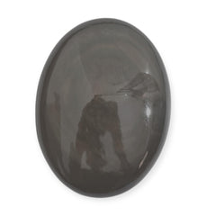 Crysmona black obsidian worry stone held in hand to ease nervous tension
