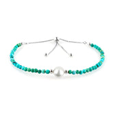 CRYSTALIS natural turquoise beads slider bracelet on wrist, showcasing vibrant color and sparkle