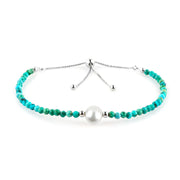 CRYSTALIS natural turquoise beads slider bracelet on wrist, showcasing vibrant color and sparkle