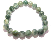 CRYSTALMIRACLE Moss Agate bracelet close-up showing 7mm beads for focused meditation