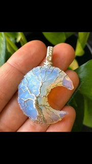 CRYSTALMIRACLE Opalite Moon Stone pendant wrapped for mindful wear and daily calm