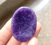 Crystalmiracle Purple Lepidolite Worry Stone promotes calm energy in daily use