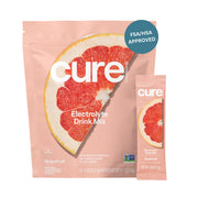 Cure Hydration grapefruit packet closeup shows convenient plant-based electrolyte mix for on-the-go hydration.