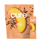 Cure Hydration Peach packet poured into water for a refreshing energy boost
