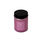 CW STUDIO Prosecco Berry Candle in a glass jar enhances any room with sparkling fragrance.