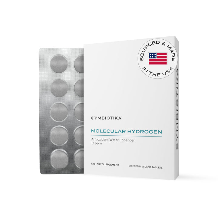 CYMBIOTIKA H2 tablets dissolving in water for quick hydration and clean taste