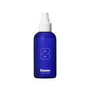 Dame Aloe Lube bottle pour showing silky glide for comfortable intimacy.