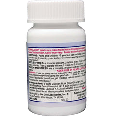 Formula 303 tablets close-up showing valerian and magnesium herbal blend