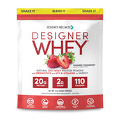 Designer Whey scoop in a bowl delivering protein for post-workout recovery.
