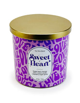 Designstyles Sweet Heart candle on a dining table creating romantic ambiance.