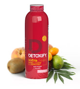 Detoxify Xxtra Clean tropical-fruit bottle, ideal for a refreshing daily detox ritual