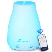 Diffuserlove 200ML diffuser on a nightstand for quiet aromatherapy ambiance.