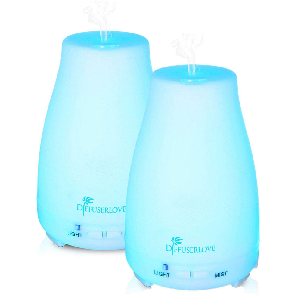 Diffuserlove 2-pack 200ml ultrasonic diffuser on desk for subtle aromatherapy.