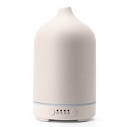 Diffuserlove ceramic diffuser with elegant cover enhances room decor and aroma.