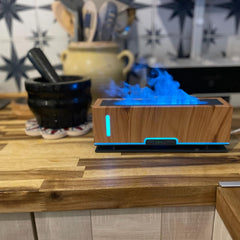 Diffuserlove Flame Diffuser displays two flame colors to set the mood.