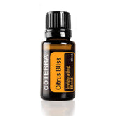 doTERRA Citrus Bliss bottle pour demonstrates an uplifting aroma for a refreshed mood.