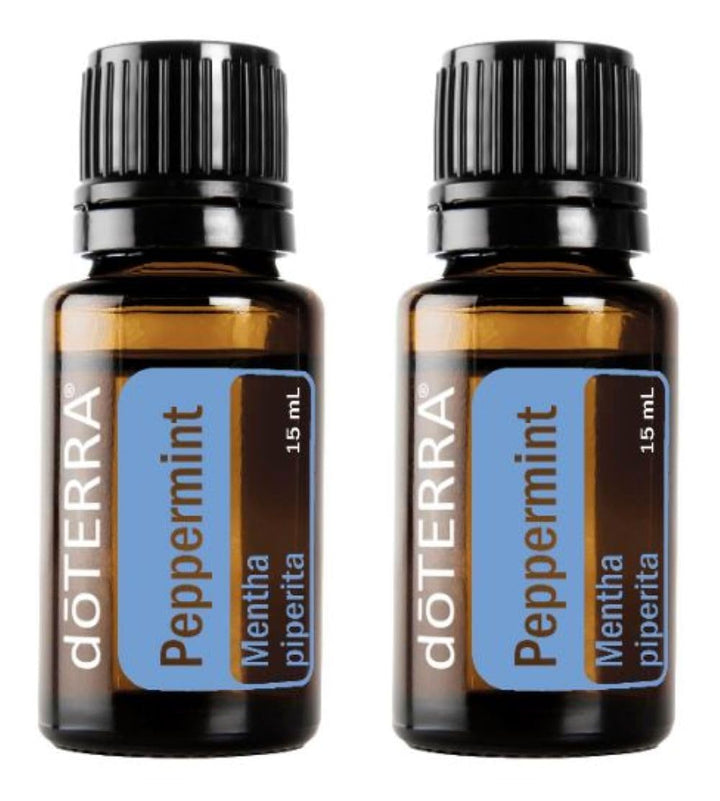 doTERRA Peppermint essential oil bottle pouring for a refreshing aroma and breathing support.