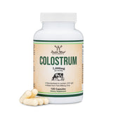 Double Wood Colostrum bottle shows 1,000 mg per serving for daily wellness potential.