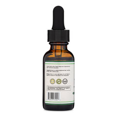 Milk Thistle drops being added to tea with Double Wood branding.
