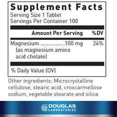 Close-up of Douglas Laboratories Chelated Magnesium tablets with smooth finish
