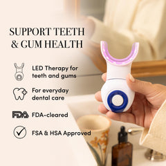 dpl Oral Care LED Light Therapy blue light directed at teeth during whitening