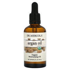 Dr. Mercola Argan Oil bottle pour enhances skin and hair with a nourishing touch.