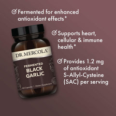 Dr. Mercola Fermented Black Garlic on kitchen counter with meals