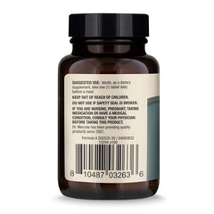 Pouring Dr. Mercola Organic Chaga bottle for convenient daily intake