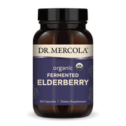 Dr. Mercola Organic Fermented Elderberry bottle on the counter supports daily wellness.