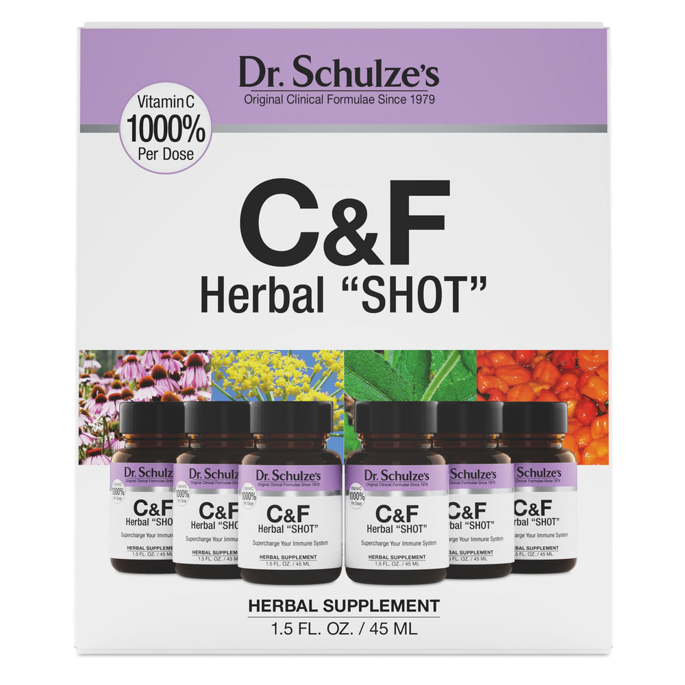 Dr. Schulze's Herbal Shot bottle pouring for on-the-go immune support.