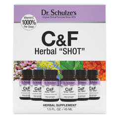 Dr. Schulze's Herbal Shot bottle pouring for on-the-go immune support.