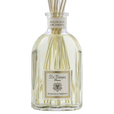 Dr. Vranjes Magnolia Orchidea diffuser bottle with reeds for refined living room ambience.