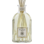 Dr. Vranjes Magnolia Orchidea diffuser bottle with reeds for refined living room ambience.