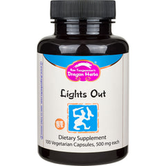 Dragon Herbs Lights Out capsules on nightstand signaling a calm bedtime routine.