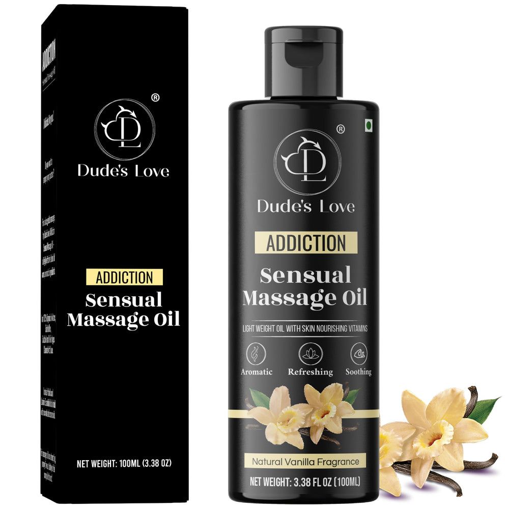 Dude's Love vanilla massage oil bottle closeup shows premium organic blend for smooth glide.