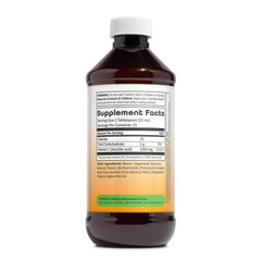Dynamic Health Liquid Vitamin C being poured into a glass for daily use.